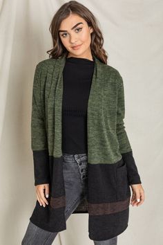 Made in the USA 95% Polyester 5%Spandex Olive, black & brown color block, pockets Size: 1X(18), 2X(20), 3X(22) 1X: Bust 48" Length 37" 2X: Bust 50" Length 37.5" 3X: Bust 52" Length 38" Black Color Block Long Sleeve Cardigan, Black Long Sleeve Color Block Cardigan, Black Workwear Cardigan With Pockets, Black Patchwork Cardigan For Layering, Black Cardigan With Pockets For Layering, Black Color Block Outerwear For Layering, Black Color Block Casual Cardigan, Casual Black Color Block Cardigan, Black Patchwork Cardigan For Fall