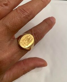 "Engraved Signet ring with Oval Seal - Best quality 18k Gold Plate over sterling silver - High Quality Special engraving technique using which create the appearance of crest or other images of your choice. Great for Men or Women. Looks great on any finger, and especially cool as a pinky ring. Please attach in \"convo box\" the picture / family crest you want me to engrave - as high quality the pic is as good the result we get If you have any questions please feel free to contact The product will Engraved Yellow Gold-plated Oval Ring, Engraved Yellow Gold Plated Ring, Engraved Oval Yellow Gold-plated Ring, White Gold Plated Signet Ring, Gold Plated Engraved Promise Ring With Polished Finish, Oval Hallmarked Gold-plated Signet Ring, Gold-plated Engraved Signet Ring, Engraved Yellow Gold Open Ring, Personalized Symbolic Yellow Gold Rings