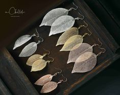 Matching Necklace: https://www.etsy.com/uk/listing/691009087/leaf-skeleton-pendant-necklace-18ct-gold?ref=listings_manager_grid Dimension:  Small leaf approx 3-4cm Large leaf  approx 5-7cm They were made with real leaf so each one is unique and size may vary slightly. Matching necklaces are available We are also introducing other jewellery made with real leaves or flowers such as maple leaves and sycamore seeds, have a look in our store to see the full range.  Production method: to make the leaf Skeleton Leaf Jewelry, Leaf Skeleton, Handwriting Gifts, Real Leaf, Real Leaves, Manualidades Diy, Eco Friendly Jewelry, Small Leaf, Nature Inspired Jewelry