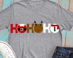 a t - shirt with the word ho ho on it next to jeans and sneakers