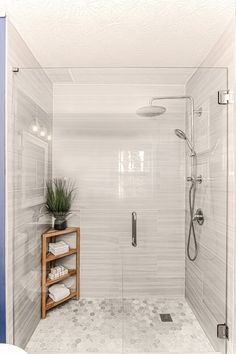 a white tiled bathroom with a stand up shower