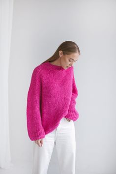 "Crafted from a soft blend of alpaca wool and silk in a vivid shade of pink, this sweater is designed for an oversized fit and has chunky ribbed trims, laid-back drooped shoulders. Wear it with classic trousers, jeans or wide skirts. Composition: alpaca wool, silk. Cerise color. Available sizes Petit size/XS/S/M/L/XL The model wearing size M and she is 172 cm/5'8\" tall. We offer the possibility to make a garment by your own measurements if you send us a message. CARE INSTRUCTIONS For best resul Pink Knitwear Outfit, Rose Pink Sweater Outfit, Hot Pink Sweater Outfit, Pink Jumper Outfit, Wide Skirts, Cerise Color, Pink Sweater Outfit, Vietnam Trip, Magenta Sweater