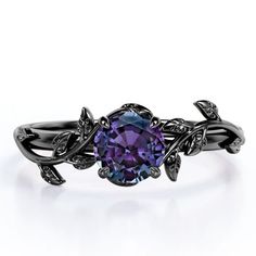 Soothe your soul with this 0.50 Carat - Round Cut Lab Created Alexandrite Ring - Leaf & Vine Engagement Ring - 18K Black Gold Plating Over Silver. Skillfully hand-cut into a nice round cut by our skilled jewelers, this alluring alexandrite gemstone ring combines 0.50 Carat alexandrite on solid rose gold plating over silver. Special and non-traditional, this alexandrite band is well-suited for those who are not quite into normal lifestyle. Reflective properties of this alexandrite ring will absol Obsidion Engagement Ring, Vampire Wedding Rings, Obsidian Ring Engagement, French Vampire, Darry Ring, Prong Setting Engagement Ring, Milgrain Wedding Ring, Prong Engagement Rings, Nature Inspired Engagement Ring