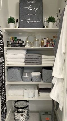 an organized closet with towels, toiletries and other items