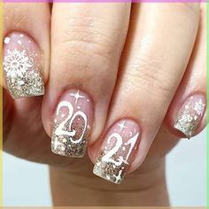 Looking for the best New Year's Eve nails? Check this post for the 80  most stunning New Years Eve nail art ideas and designs to copy this year. From sparkle short NYE nails to glitter simple long nail ideas, we've got you covered! New Years Nail Art For Short Nails, New Years Eve Nails Ideas 2023, Nye Sparkle Nails, Happy New Year Nails Designs 2023, Nail Art New Years Eve, New Years Themed Nails, New Years Inspired Nails, New Years Nail Designs 2023, New Years Nails Sparkly