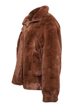 Look chic and stay cozy in this Gerard Darel faux fur collared jacket! The neutral-toned, rich brown hue will make any outfit look sleek, while the soft and ultra-fluffy faux fur keeps you warm. Pair with some tall boots and you'll be lookin' fly and feeling toasty! Size L (Gerard Darel 3) 100% Polyester Lined Front zipper w/ snap closures Two snap closure pockets Two internal pockets Elastic cuffs Bust 46" Waist 46" Shoulder to hem 27" Shoulder to shoulder 22" Sleeve length 23" Brown Fur Coat With Faux Fur Lining, Brown Long Sleeve Fur Coat With Faux Fur Trim, Brown Faux Fur Trim Coat For Fall, Brown Fur Coat With Faux Fur Trim, Solid Color Outerwear With Faux Fur Trim, Faux Fur Trim Outerwear, Cozy Brown Outerwear With Faux Fur Trim, Chic Brown Fur Coat For Cold Weather, Brown Fluffy Long Sleeve Fur Coat