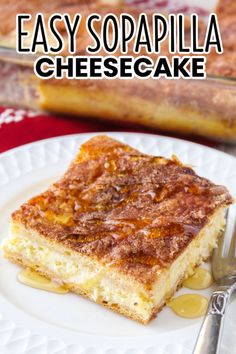 a close up of a piece of cake on a plate with the words easy sopapilla cheesecake