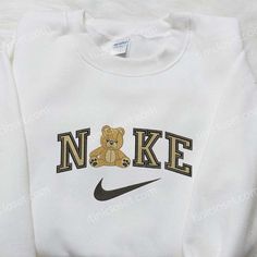 Introducing the TeddyBear x Nike Embroidered Sweatshirt, the perfect blend of comfort and style. Crafted with precision, this sweatshirt features Nike Embroidered Sweatshirt, Teddy Bear Embroidery, Nike Inspired, Nike Crewneck Sweatshirt, Bear Embroidery, Custom Sweaters, Nike Crewneck, Diy Sweatshirt, Cartoon Shirts