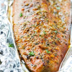 baked salmon fillet in foil with the title above it