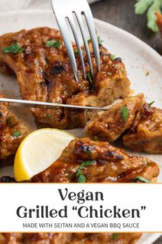 vegan grilled chicken on a plate with lemon wedges