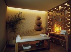 a spa room with stone and wood accents