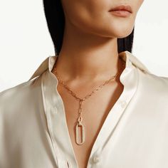 An elongated 14k gold pavé linked pendant hangs heavy at the end of our signature paperclip chain. Clasp it anywhere along the chain for endless lariat looks to elevate your everyday! SKU #CN518PV 14mm x 45mm linked pendant lariat necklace 234pc 0.7-1.4mm G-H VS1-SI1 pavé set diamonds 59pcs G/H SI pave set round diamonds 0.64ctw 3.3mm paperclip chain 14k yellow or white gold Lariat Necklace, G H, Paper Clip, Pave Diamonds, Long A Line, Round Diamonds, The End, Diamonds, White Gold