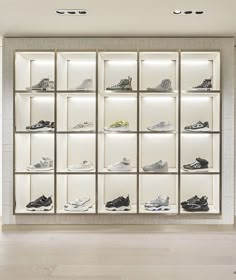 a display case filled with lots of shoes