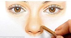 a person is drawing on the face of a woman's face with a pencil