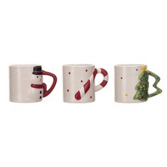 three coffee mugs with christmas decorations on them, one has a snowman and the other has a candy cane