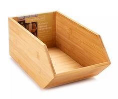 a wooden box with compartments for pens and pencils on the inside is made out of bamboo