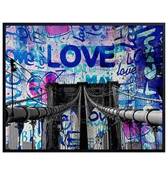 the brooklyn bridge is covered in graffiti and has love written on it's side