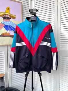 FOLLOW MY SHOP TO CHECK DAILY UPDATES & PRICE DROPS Follow us on Instagram @beton_vintage 10% off when you buy 2 items 15% off when you buy 3 items 20% off when you buy 4 items Vintage Adidas Track Retro Jacket Baggy Nylon 90s / 80s Blue  Vintage Adidas Track Firebird Retro Jacket 90s Blue Size : XXS - XS  ❗️All our items are measured in a horizontal position and the dimensions are shown in the 3 photo Material : Nylon Condition : 10/10 Jacket is in very good pre-owned condition Please, check photo carefully! Please ask any necessary questions before making a purchase. Shipping Information: Processing Time: We ship items within 2-5 business days after receiving payment. Shipping Method: Standard International Shipping is used for all orders. A tracking number will be provided once your ite Vintage Street Style, Adidas Vintage, Retro Jacket, Adidas Track Jacket, Nike Windbreaker, Adidas Track, Firebird, Vintage Adidas, Light Jacket