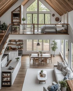 a living room filled with furniture and lots of windows