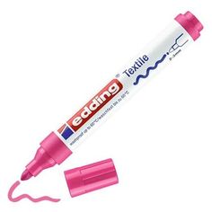 a pink marker pen sitting on top of a white surface