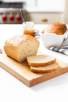 a loaf of bread sitting on top of a cutting board