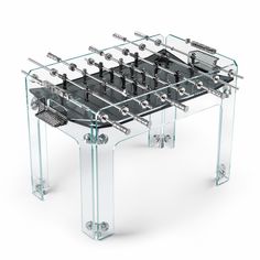 a clear foosball table with four legs