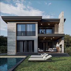 a modern house with a pool in the front yard