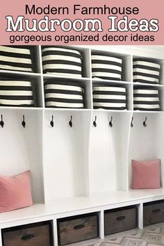 the mudroom is organized with storage bins and baskets on each side, along with pink pillows