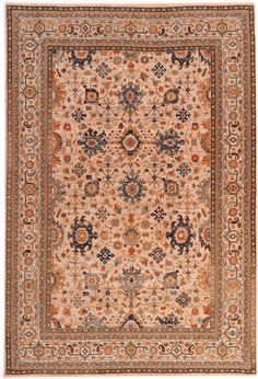 an antique rug with many different colors and patterns