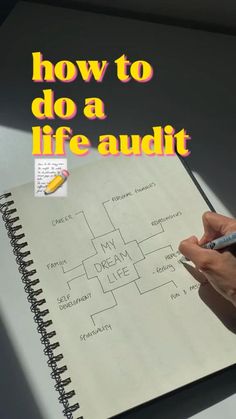 a hand writing on a notebook with the words how to do a life - autit