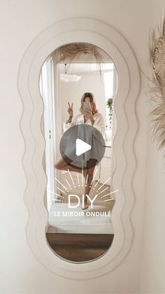 a mirror that has a reflection of a woman in it with the words diy on it