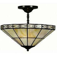 a light fixture with a stained glass shade