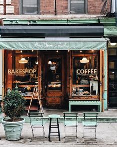 an outdoor cafe with tables and chairs outside