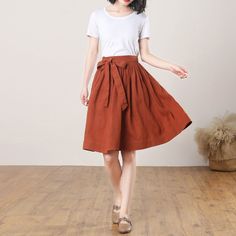 "This Pleated midi skirt is perfect for this summer, Crafted with 100% linen,  featuring elasitc high waist and deep pocket, comfy and versatile ★★FEATURES 100% Linen Back elastic waist Two side pockets Pleated skirt Regular fit A Line skirt No lining Perfect for Summer, Spring, Autumn ★★ Model Size Height approx 162 cm (5′ 4″)  Bust 84 cm (33\")  Waist 66 cm (26\")  She wears size XS. ★★ Bespoke Order Service If you Request other color Request the length Your height is not between 155 cm- 172 c Solid Cotton Pleated Skirt For Summer, Casual A-line Pleated Skirt For Summer, Casual A-line Pleated Summer Skirt, Cotton A-line Summer Skirt, Summer Workwear Skirt In Solid Color, Summer Workwear Skirt Solid Color, A-line Cotton Bottoms For Summer, Solid Color Summer Skirt For Work, Summer Linen Midi-length Bottoms