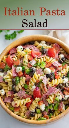 a pasta salad in a wooden bowl with the title above it that reads italian pasta salad