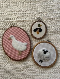 three different types of embroidery on fabric