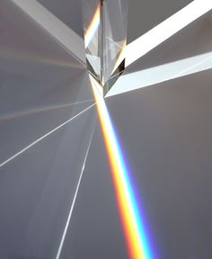 a rainbow is seen through an object in the sky