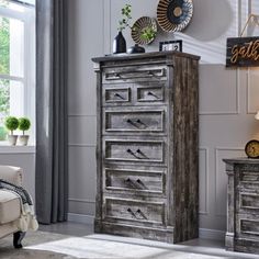 an old dresser and chair in a living room