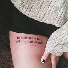 a woman's leg with a tattoo saying, but without the dark we'd never see the stars