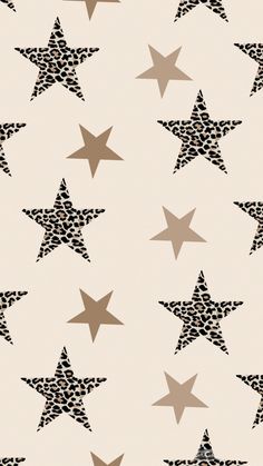 a pattern with stars on it in black and beige colors, which is very similar to the