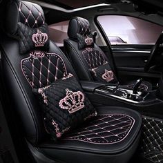 pink crown car seat covers on black leather with diamond stitching in the front and back