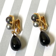 Formal Teardrop Clip-on Pearl Earrings, Classic Black Clip-on Earrings, Vintage Teardrop Clip-on Earrings, Vintage Black Round Clip-on Earrings, Black Onyx Earrings With Polished Finish, Luxury Vintage Black Clip-on Earrings, Givenchy Earrings, Black Enamel Onyx Drop Earrings, Aqua Earrings