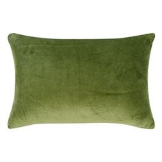 a green velvet pillow on a white background