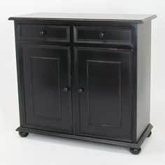 a small black cabinet with two doors and one drawer on the bottom, against a white background