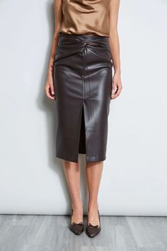 Our Vegan Leather has the luxe touch, patina and drape we wanted for our twist midi skirt. Versatile and chic, our vegan leather skirt has the cool factor Green Leather Skirt, Leather Skirt Outfit, Vegan Leather Skirt, Leather Skirts, Twist Knot, Fashion 2024, Elie Tahari, Cream Sweater, Preppy Outfits