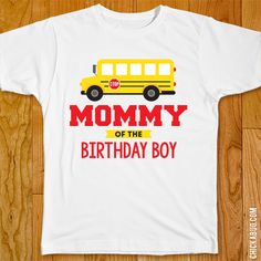 a white t - shirt with a yellow school bus and the words charlie on it