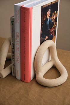 a bookend made out of two books sitting next to each other