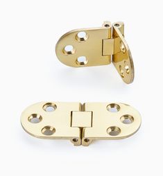 brass plated door hinges on white background