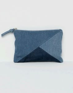 a blue denim pouch with a zipper on it