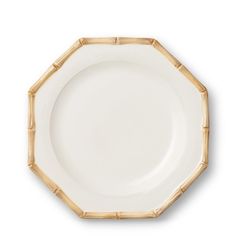 a white plate with bamboo decoration on it